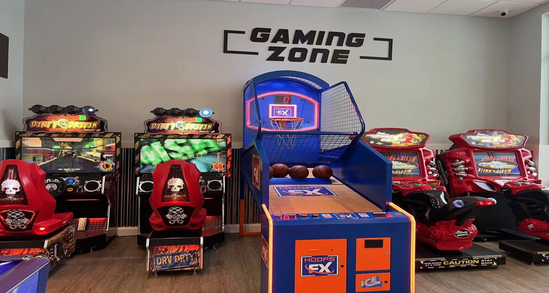 Arcade games light up a fun-filled game room.
