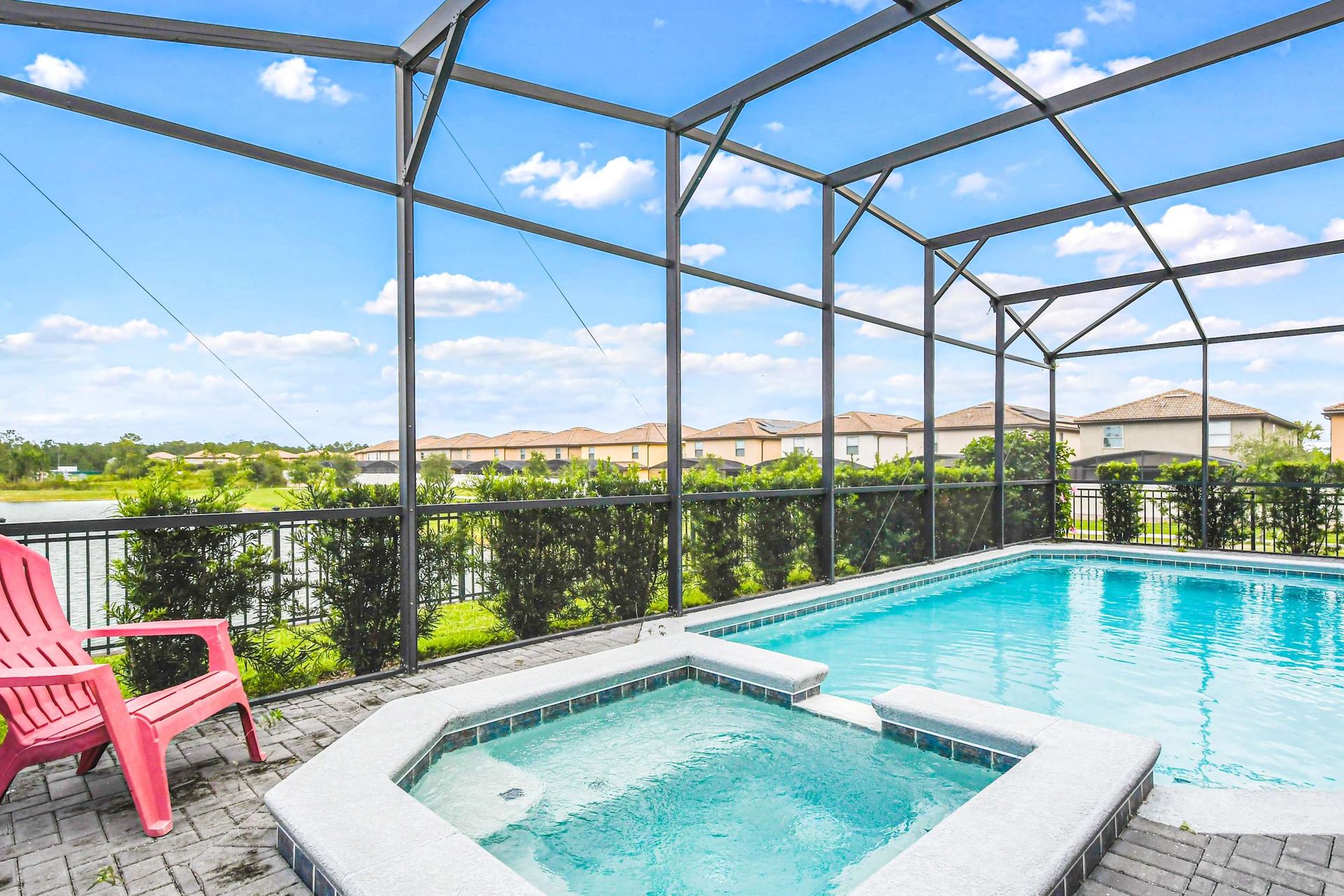 Private screened-in pool & spa with lush surroundings—your perfect getaway oasis!