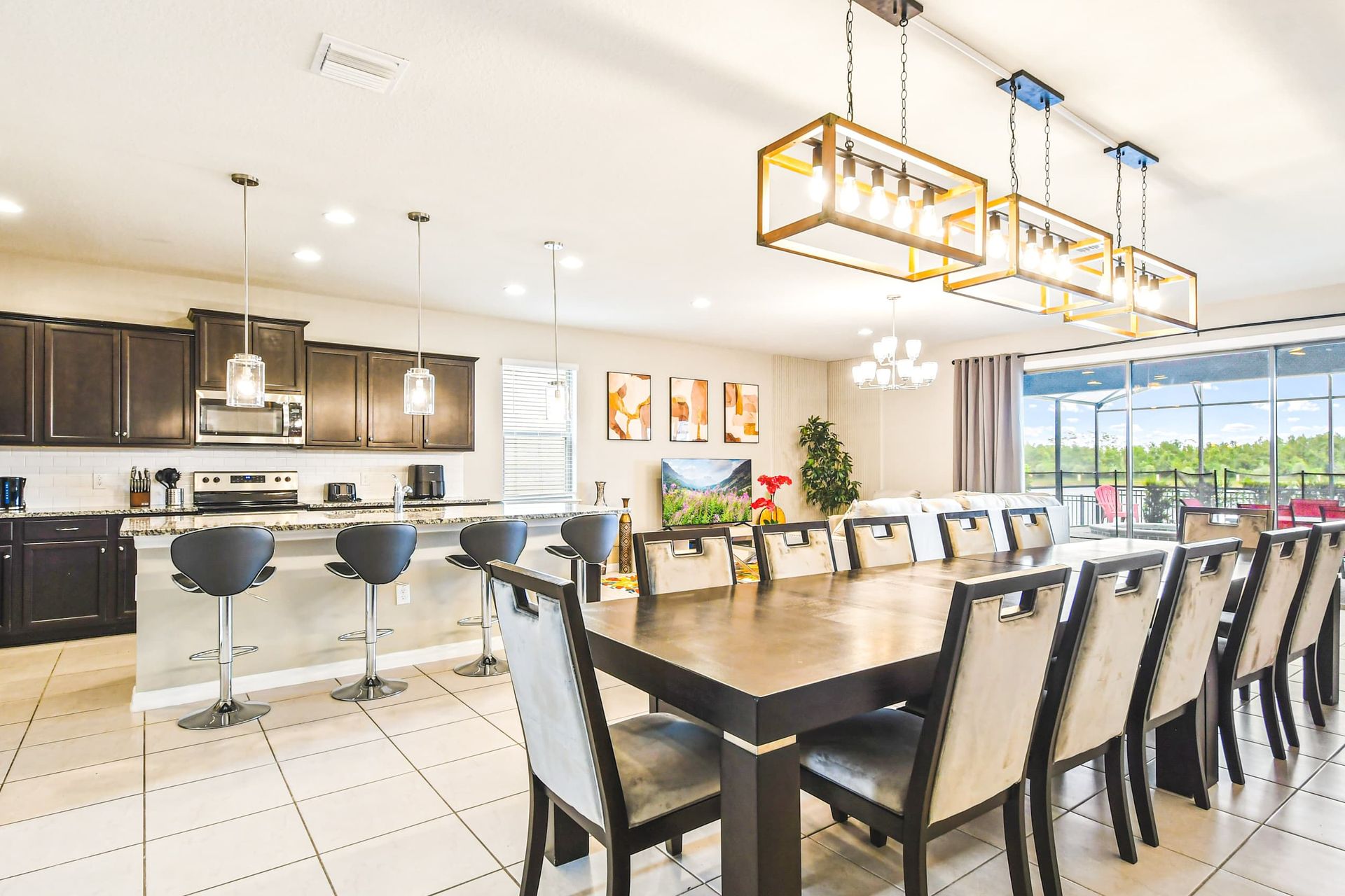 Spacious open-concept kitchen & dining, modern lighting, and stunning lake views!