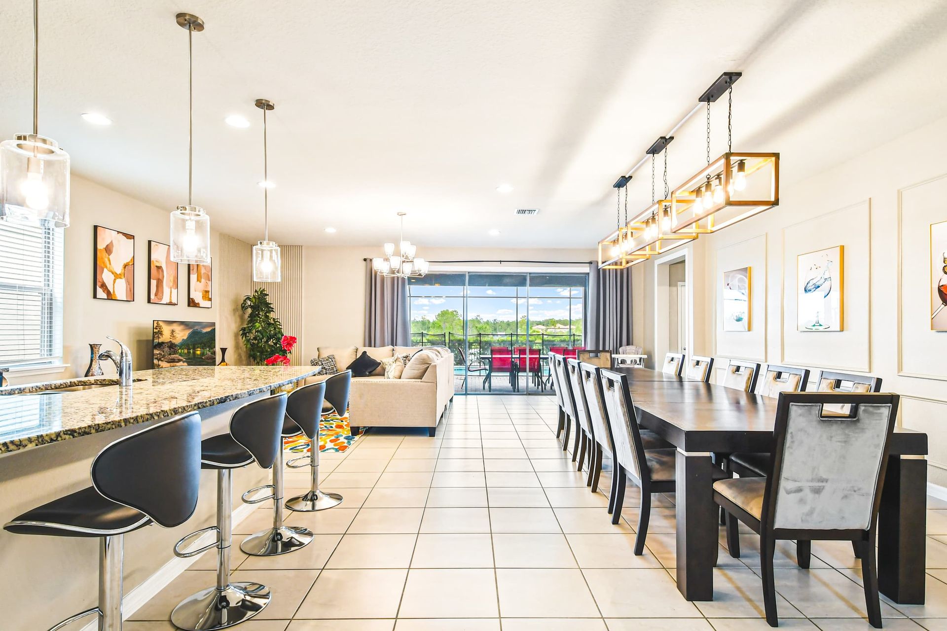 Elegant dining space with chic lighting, modern art, and seating for the whole group!
