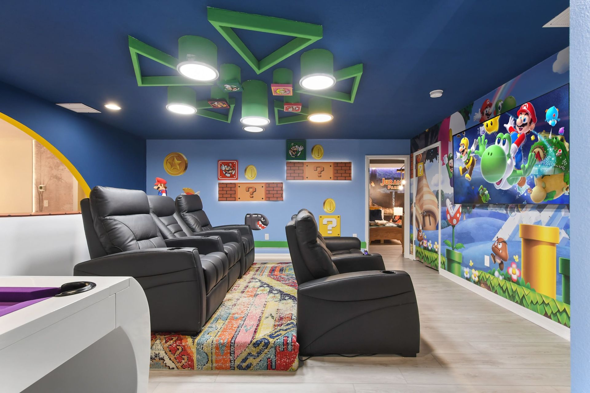 Epic Super Mario-themed theater with plush seating & game night vibes!
