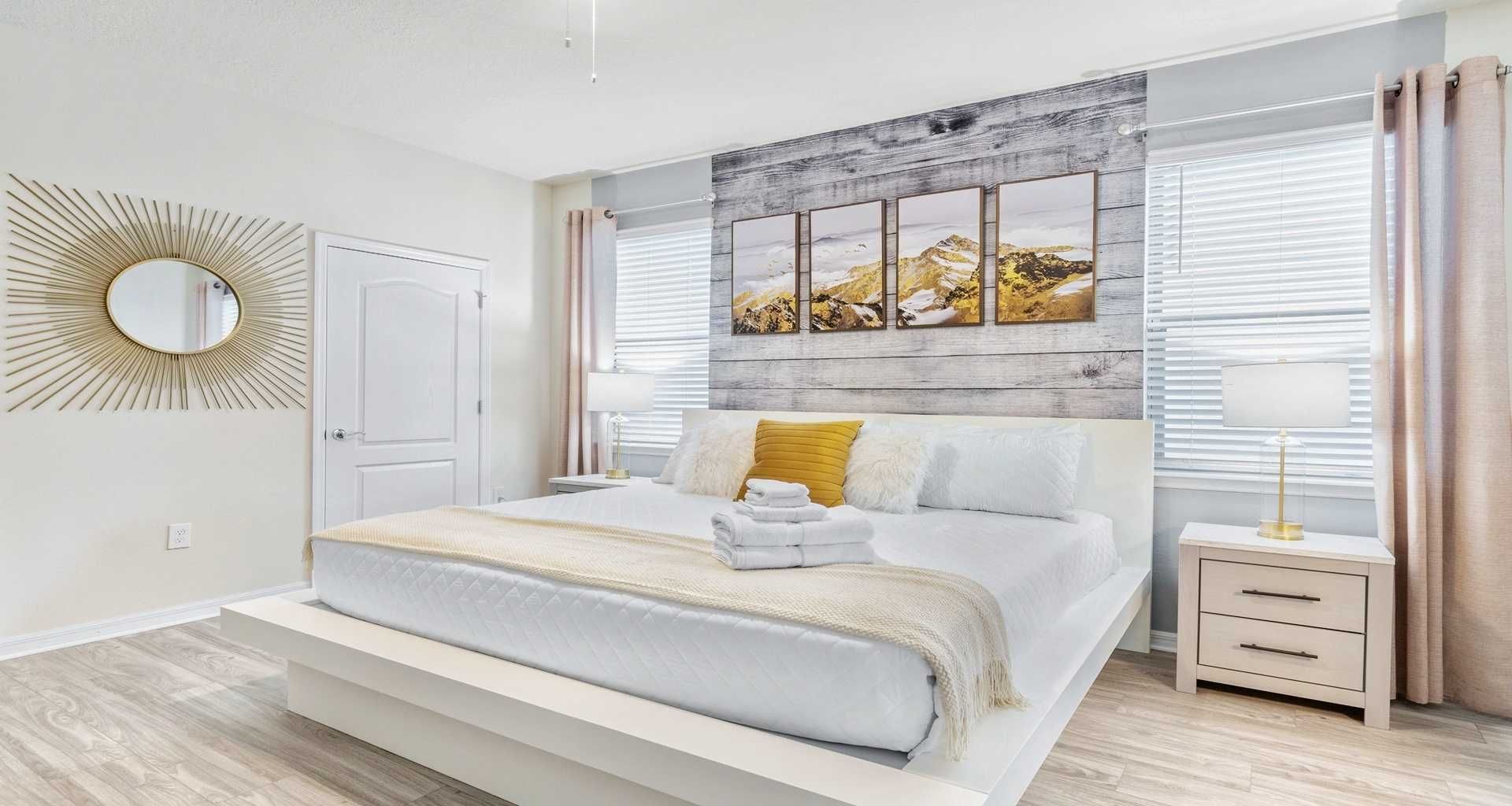 Spacious first floor bedroom with king bed and connected bathroom.