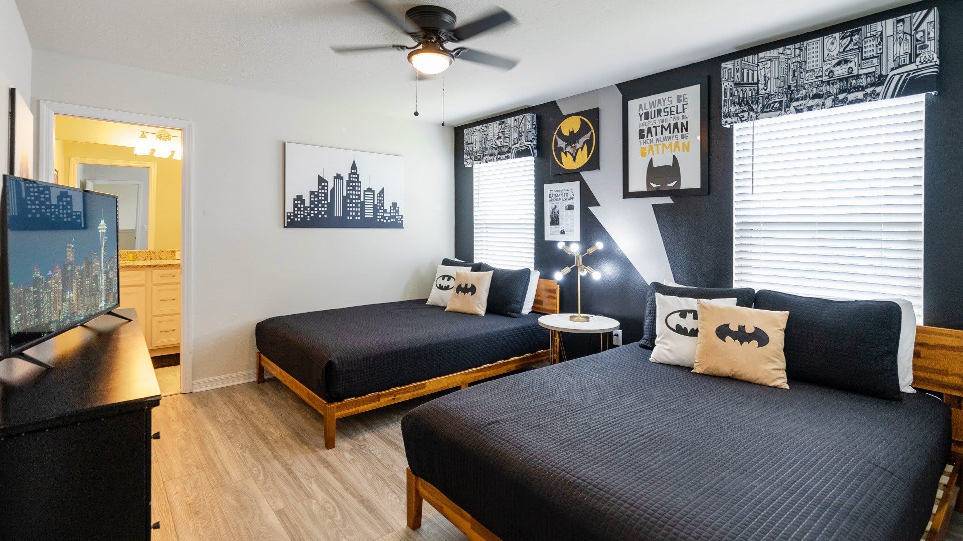 Kids will love the upstairs bedroom with a cool Batman theme