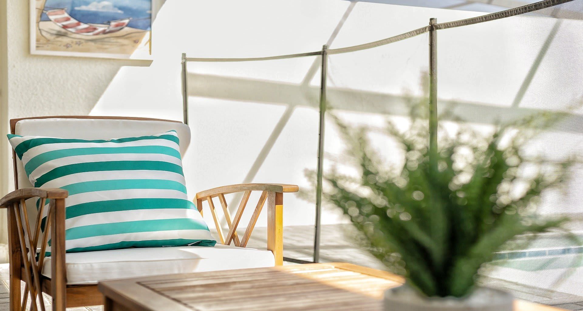 Poolside Seating: Enjoy outdoor comfort with seating by the pool