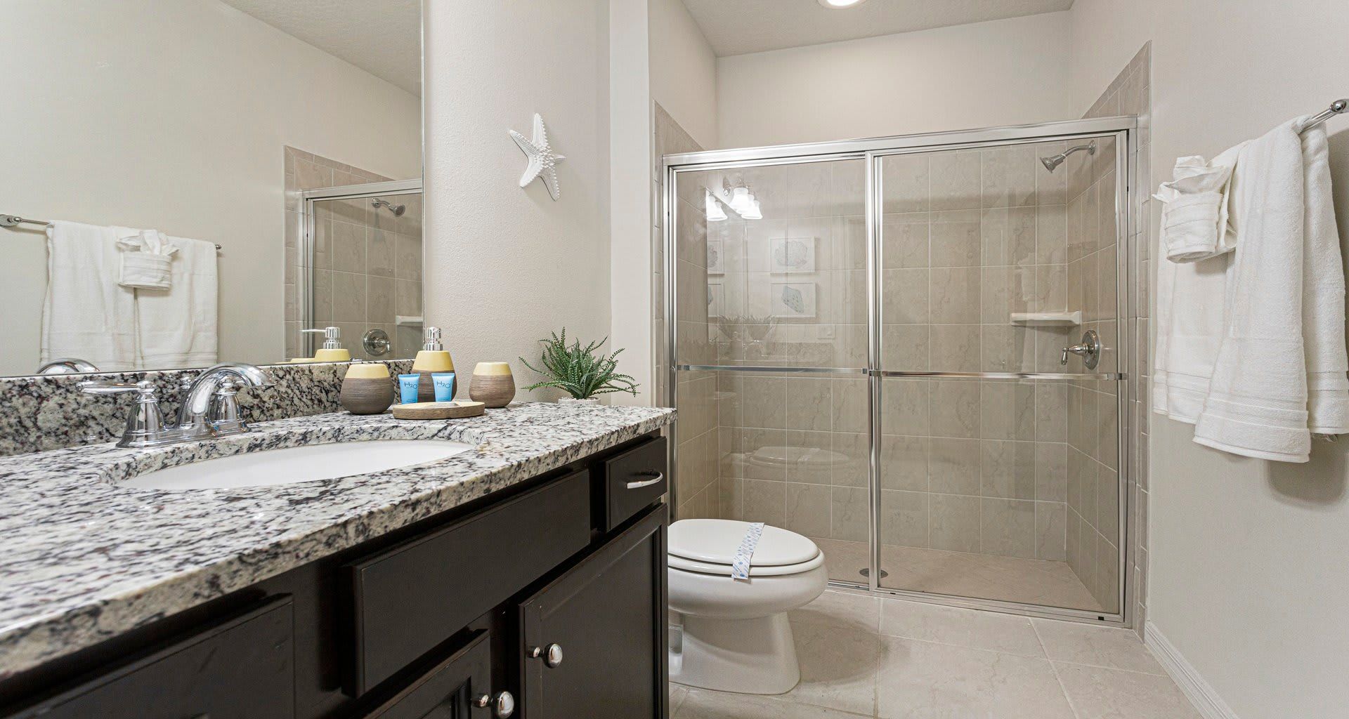 Bathroom: Functional and pristine, providing a clean and well-appointed space