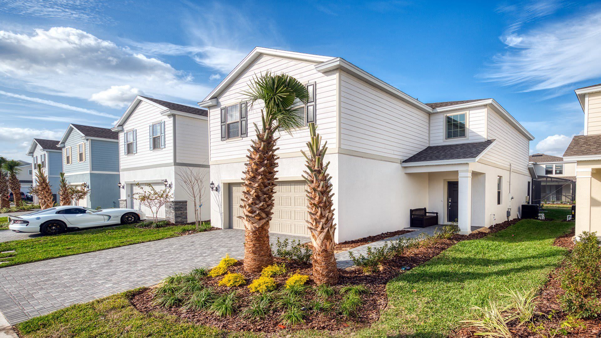 Home Exterior: Modern elegance meets lush greenery