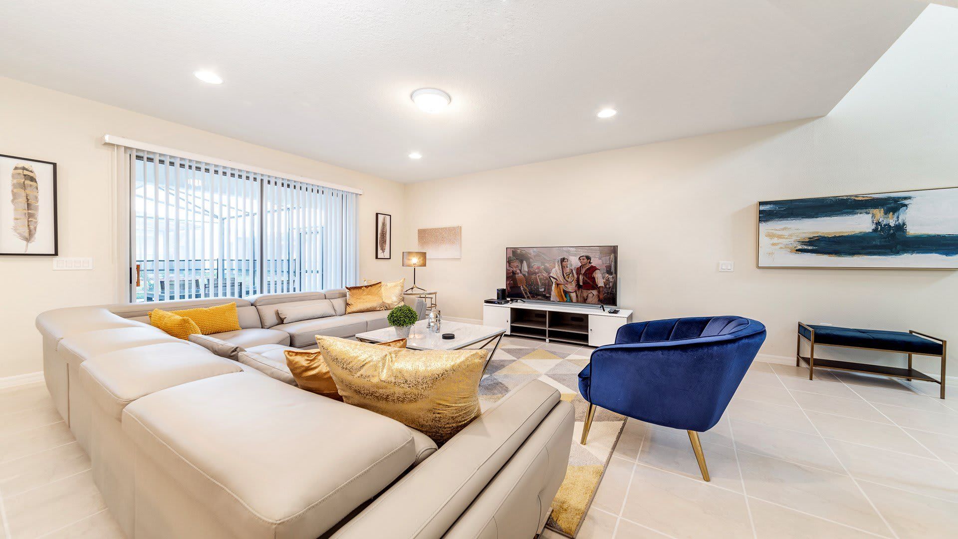 Living Room: Spacious and inviting, the area features a cozy sofa