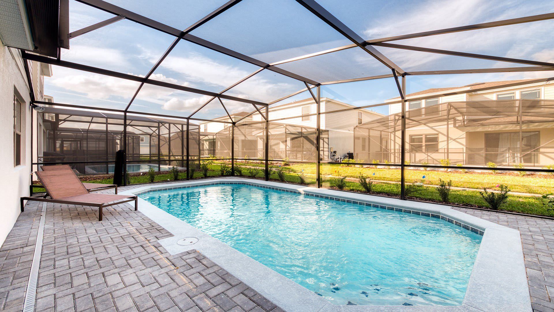 Private Oasis: Enjoy exclusive access to the screened-in spa and pool