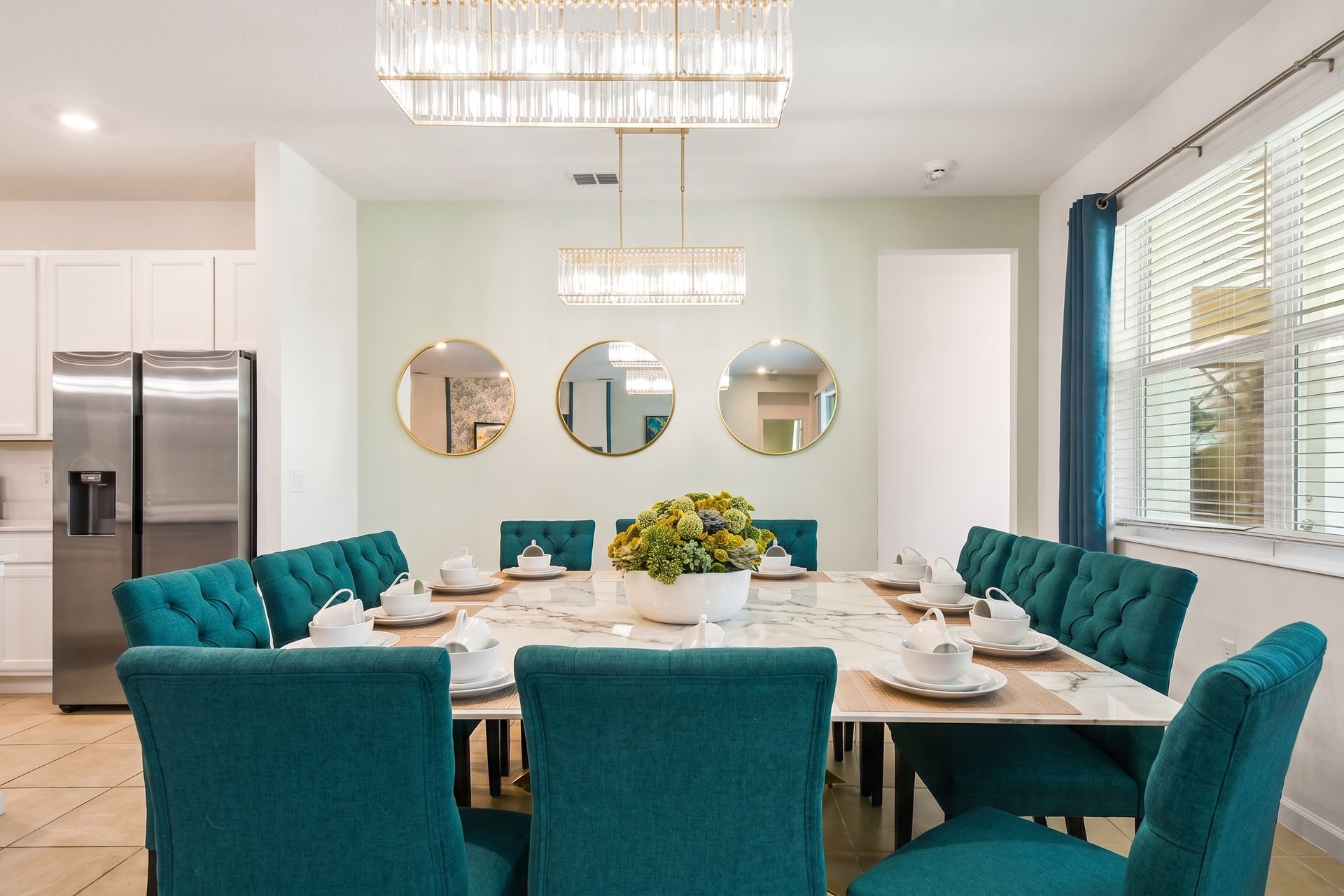 Elegant dining space with plush seating, chic décor, and perfect for group gatherings!