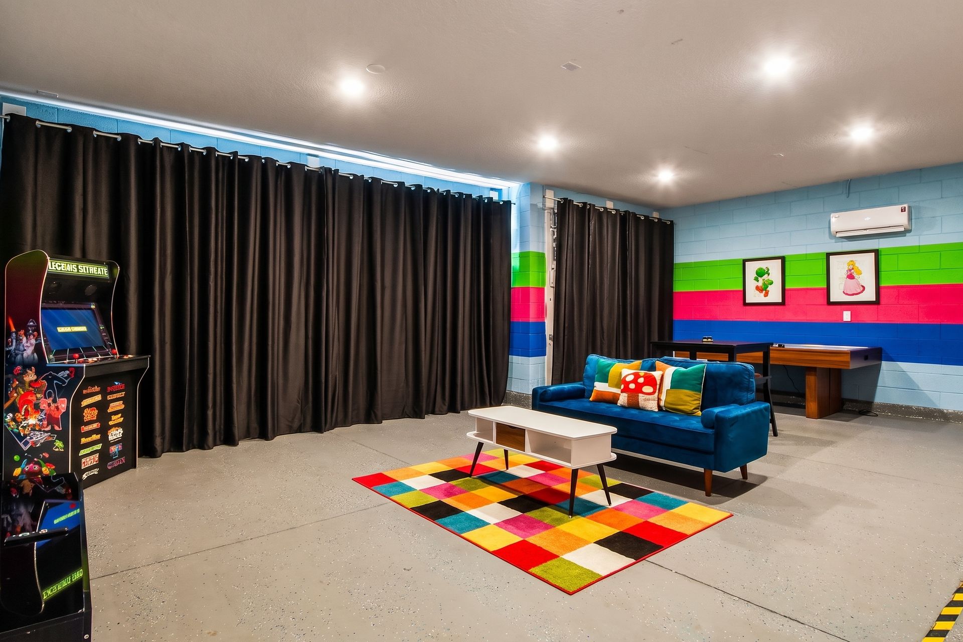 Fun-filled game room with arcade games, vibrant décor, and cozy lounge seating!