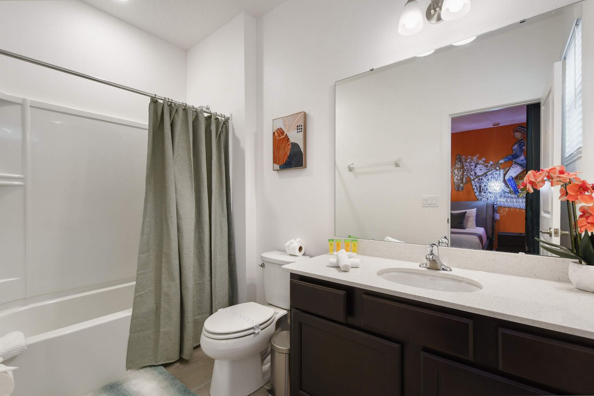 Spacious master bathroom with dual sinks, a glass-enclosed shower, and modern touches!