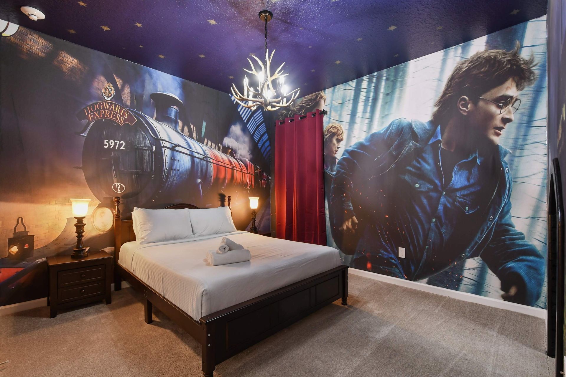 Wizard-themed bedroom with enchanted castle decor, magical murals, and cozy beds.