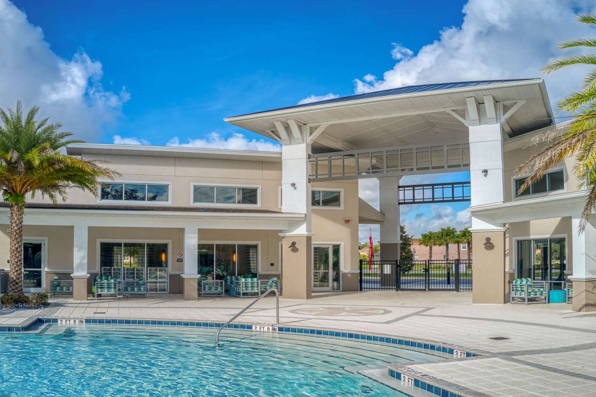 Luxury resort-style getaway with a pool, palm trees, and modern amenities!