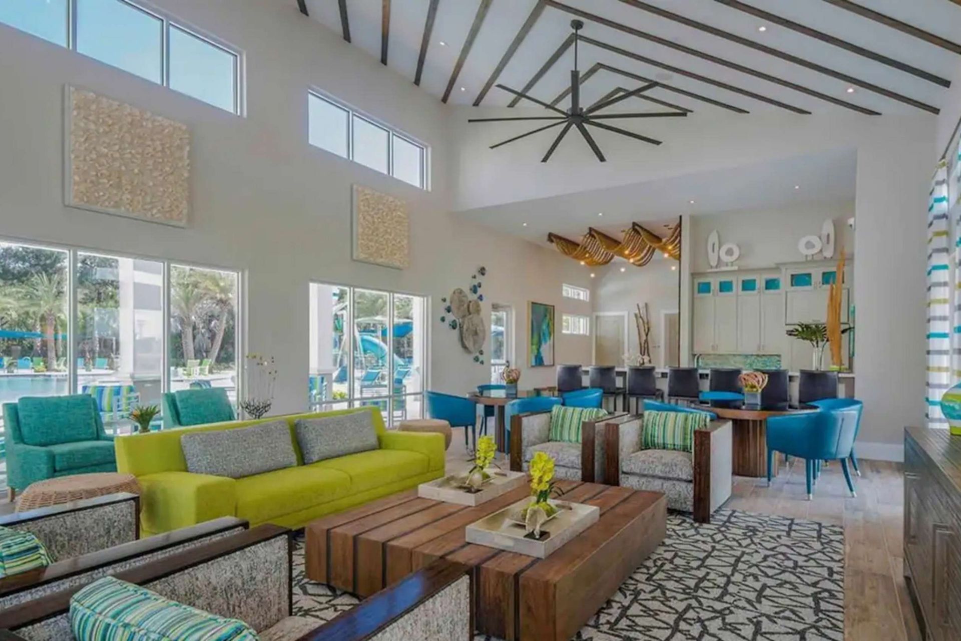 Stylish clubhouse with modern decor, cozy seating, and poolside views for relaxation