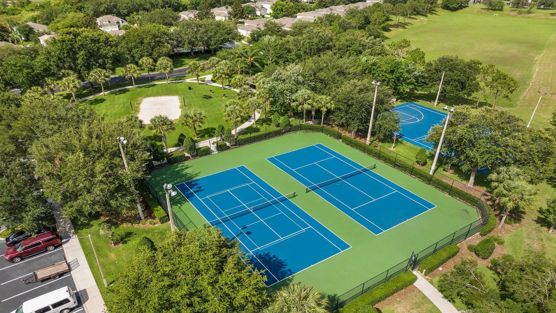 Resort sports paradise! Tennis, basketball & volleyball in a lush setting!