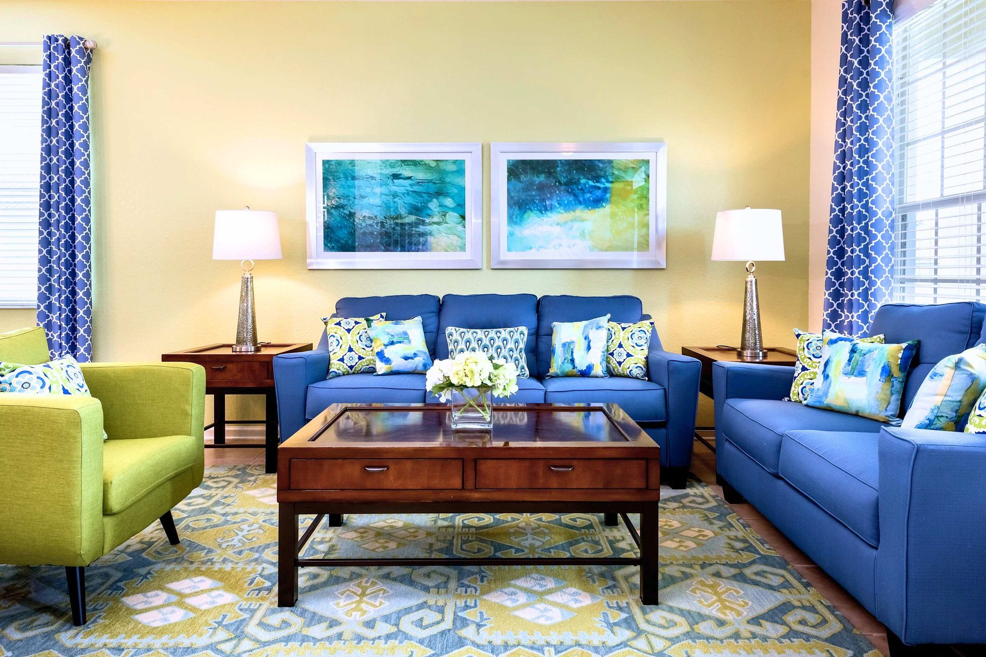 Vibrant, stylish living space with cozy seating, modern decor, and natural light.