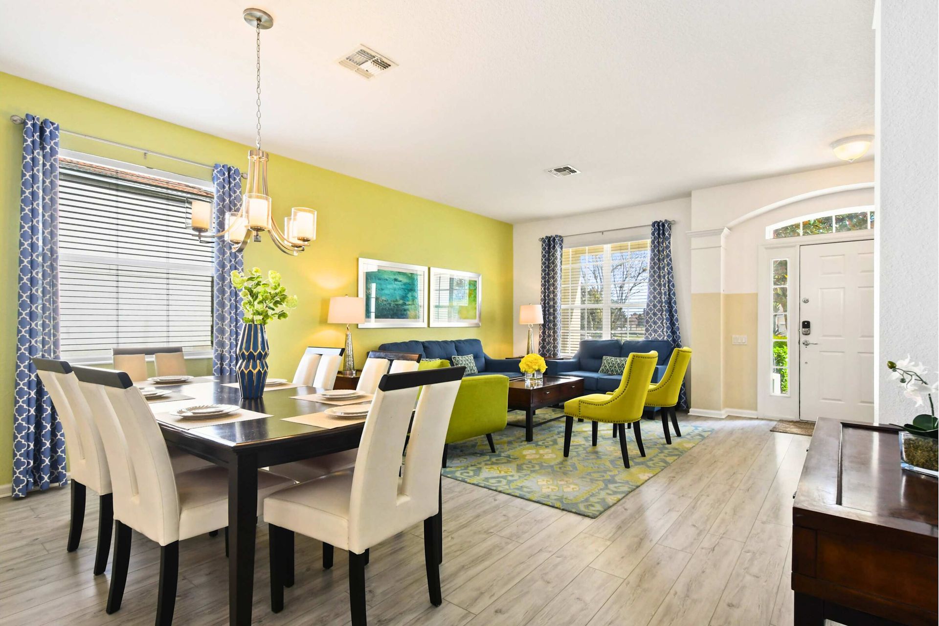 Spacious open-concept living and dining area with stylish decor, perfect for groups.