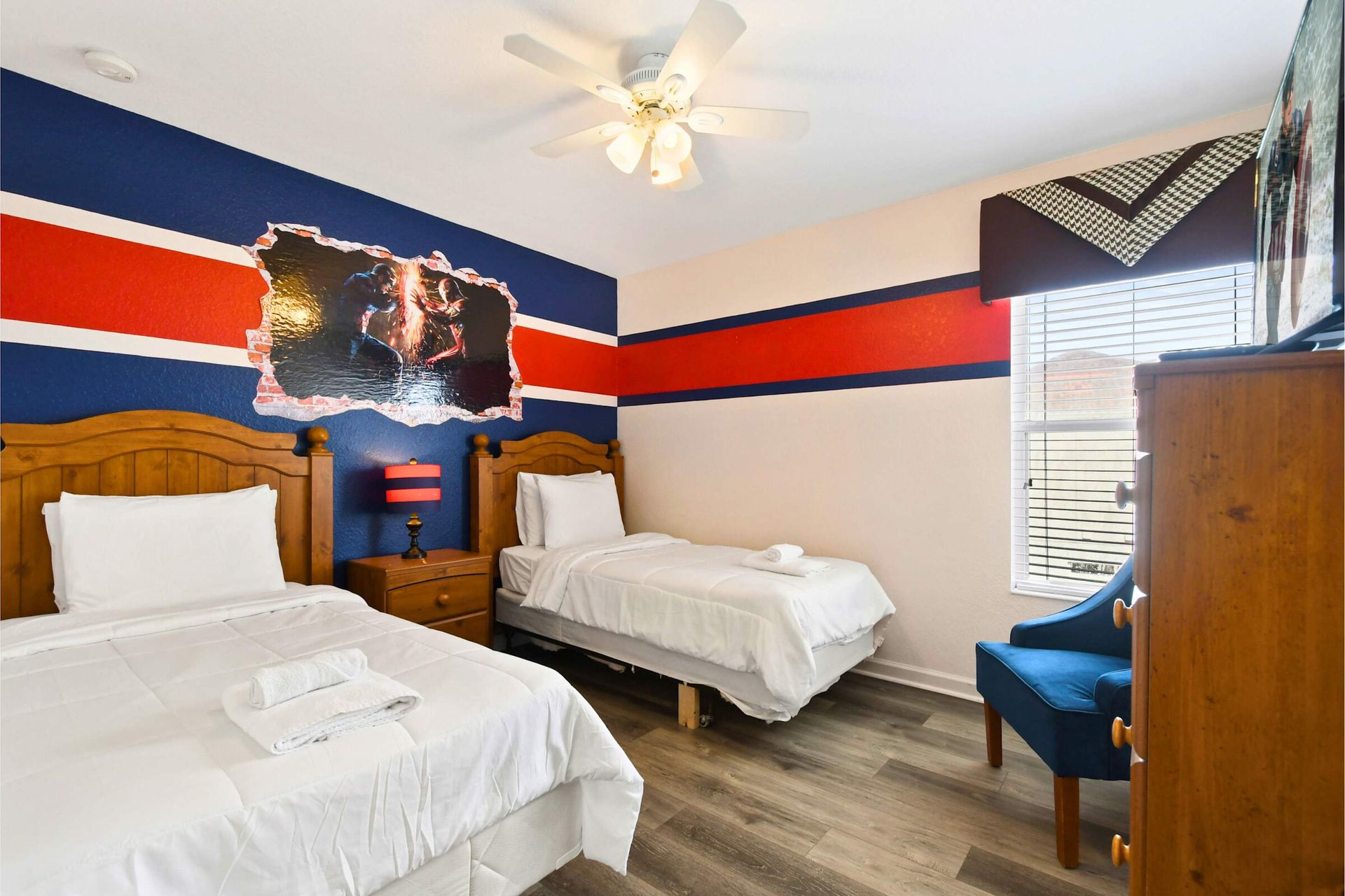 Fun and vibrant twin bedroom with bold decor, cozy beds, and an exciting theme.