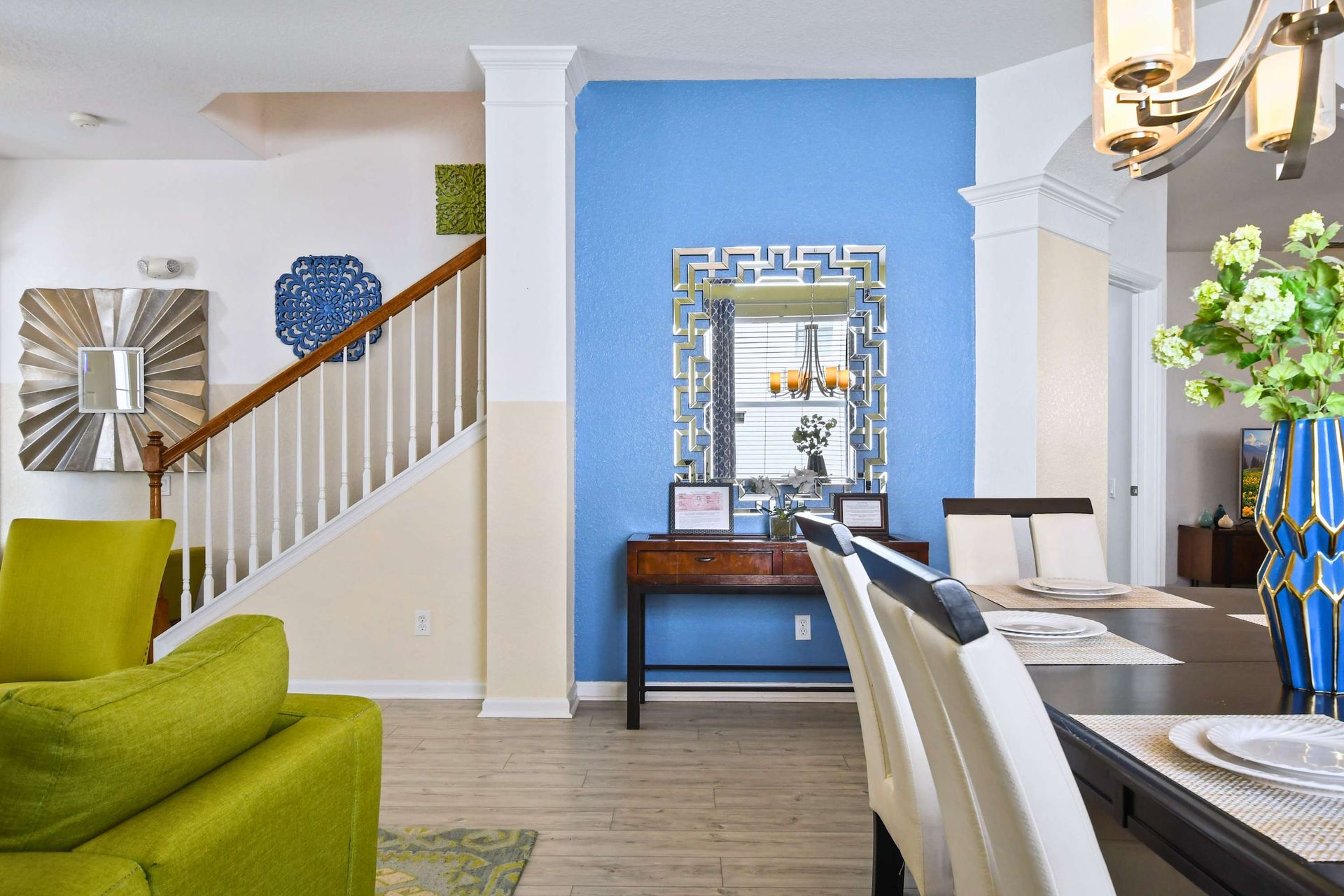Bright and elegant dining space with bold accents, modern decor, and cozy charm.