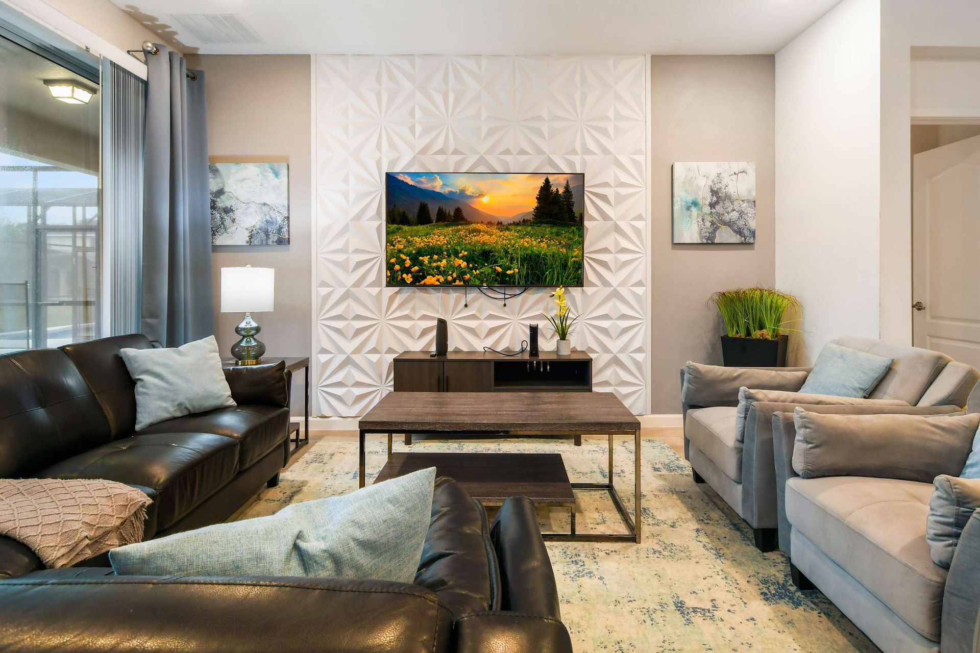 Modern luxury living room with stylish decor, cozy seating, and a smart TV.