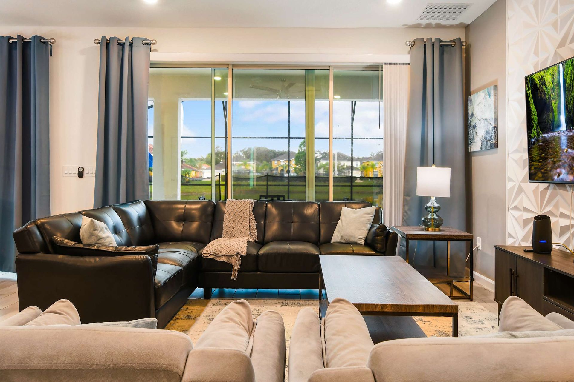 Enjoy quality time with loved ones in our inviting living room, offering a cozy space for relaxation.