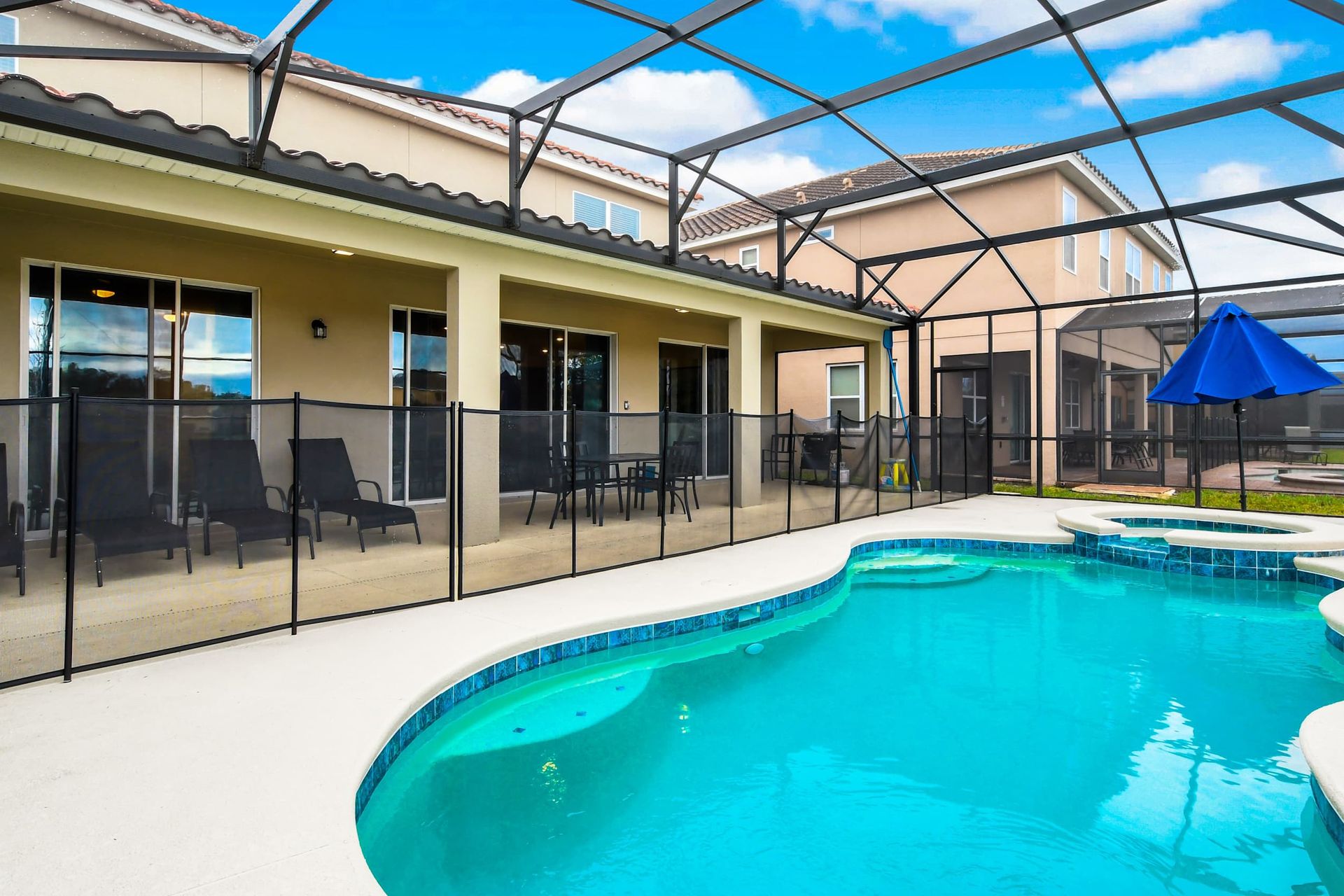 Luxury resort-style getaway with a pool, palm trees, and modern amenities!