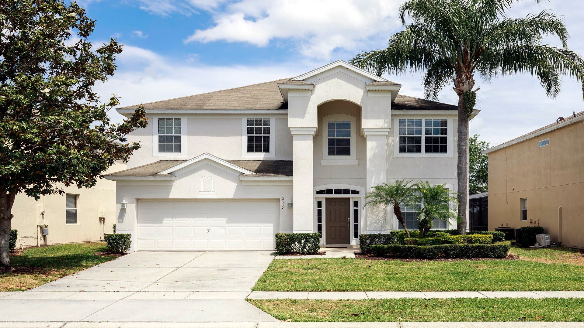 Spacious lakeview villa with a private pool, modern decor, and themed rooms.