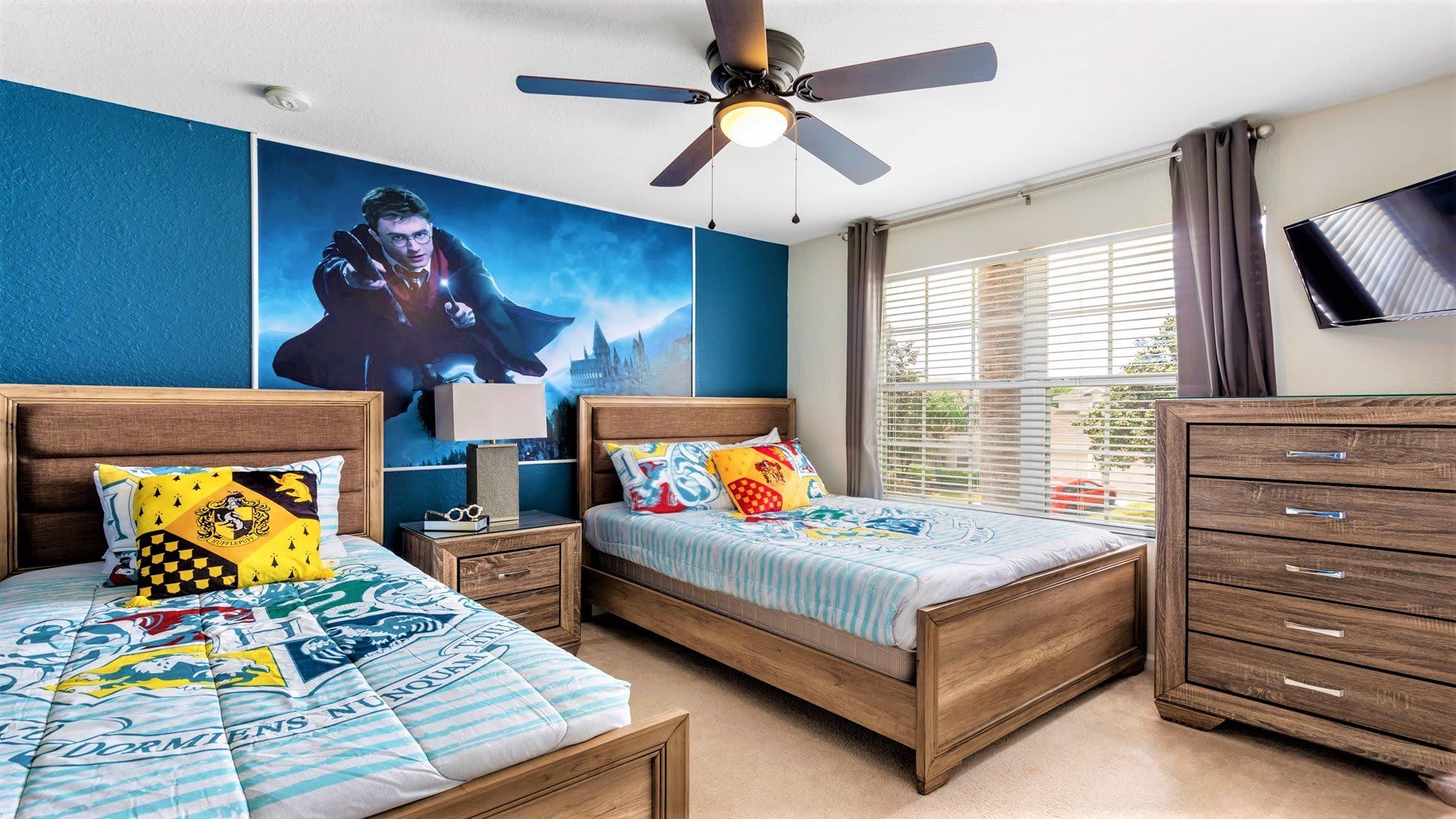 Kids will love the upstairs bedroom with a cool Harry Potter theme