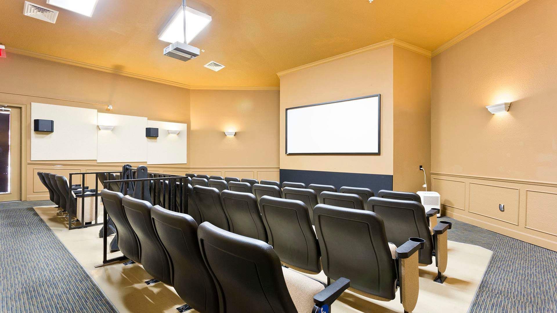 Enjoy movie nights in a private resort theater with comfy seating! 