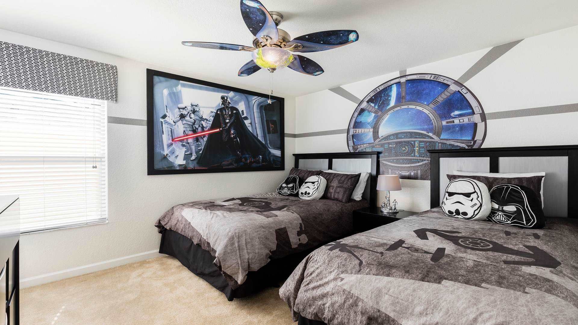 Kids will love the upstairs bedroom with a cool Star War theme