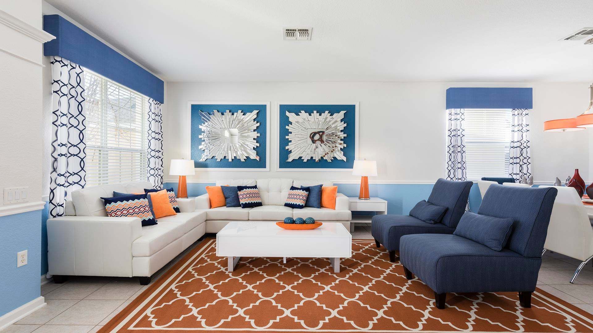 Spacious living room area with cozy sofa, perfect for family reunion