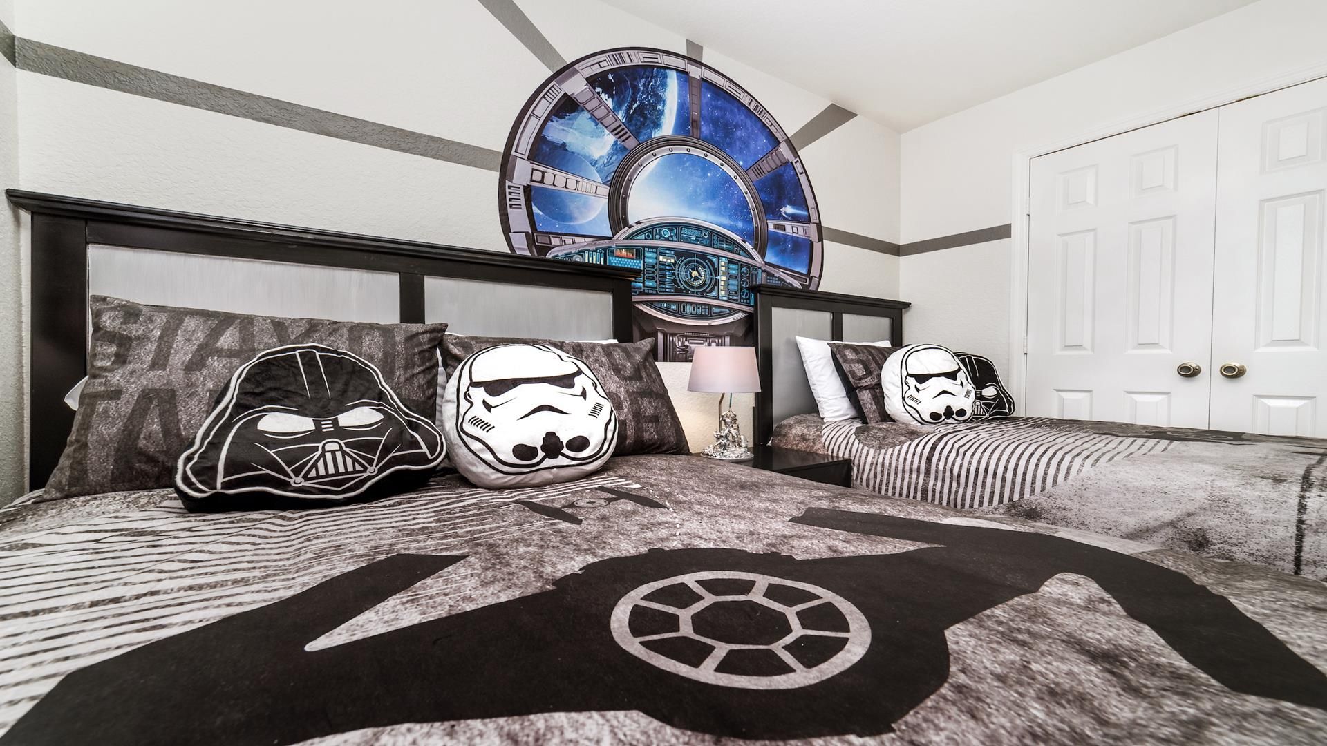 Enjoy a blissful night's sleep in our plush Starwars Themed bedroom, designed for your utmost comfort.