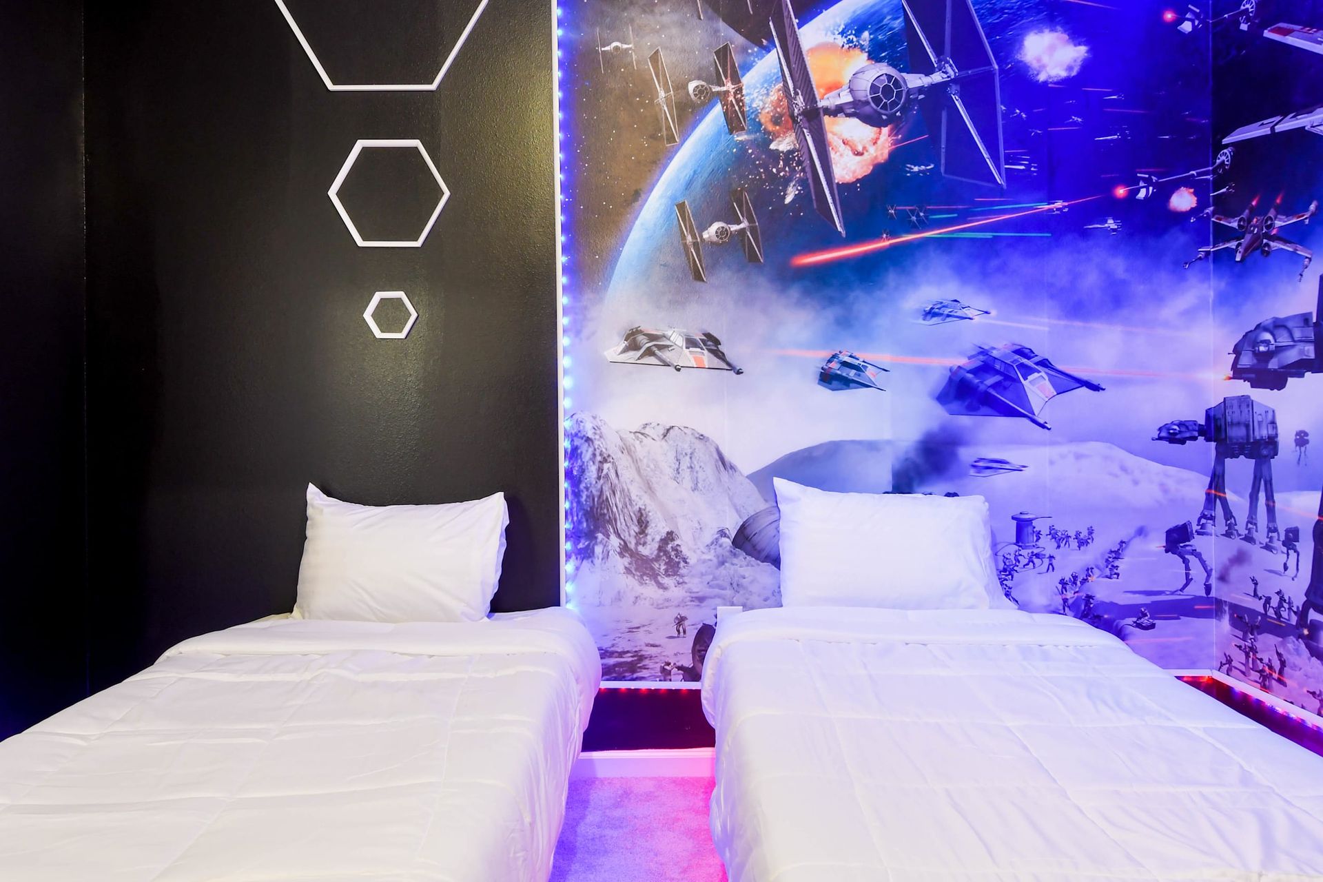 Sleep among the stars in this epic space-themed bedroom with glowing LED accents.
