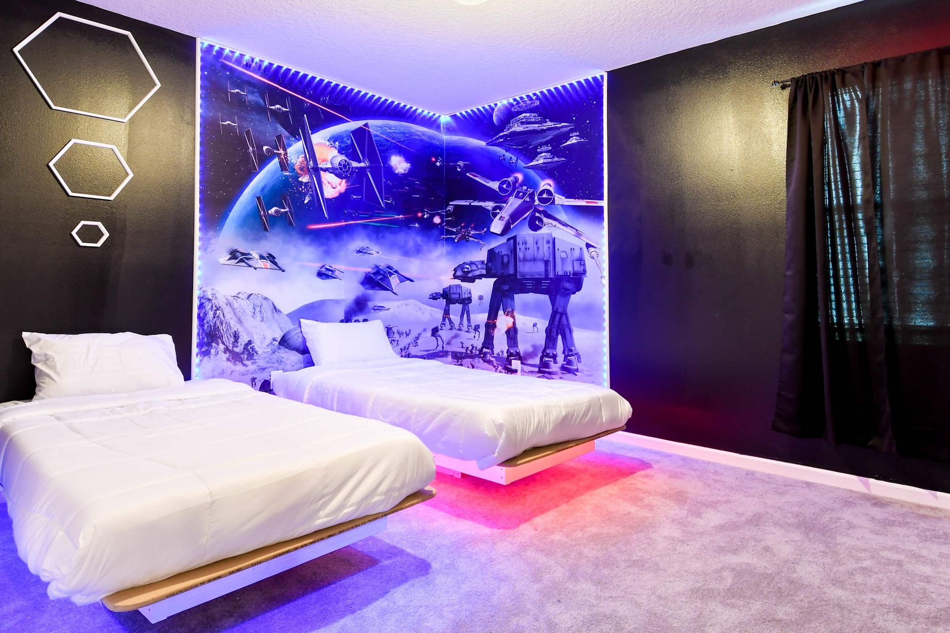 Futuristic space-themed bedroom with floating beds, LED lighting, and epic décor.