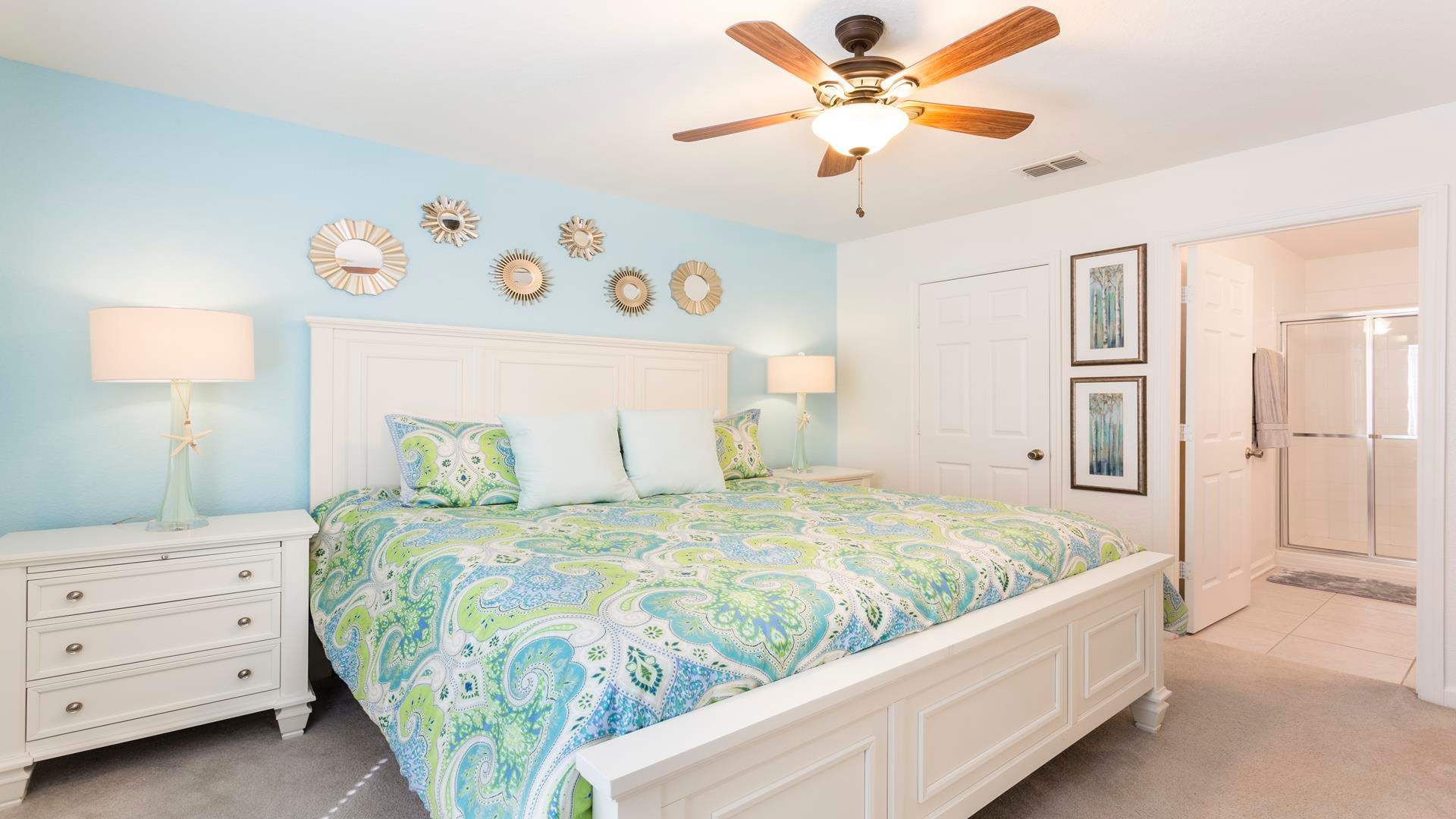 The spacious bedroom with a comfortable king bed and en suite shower