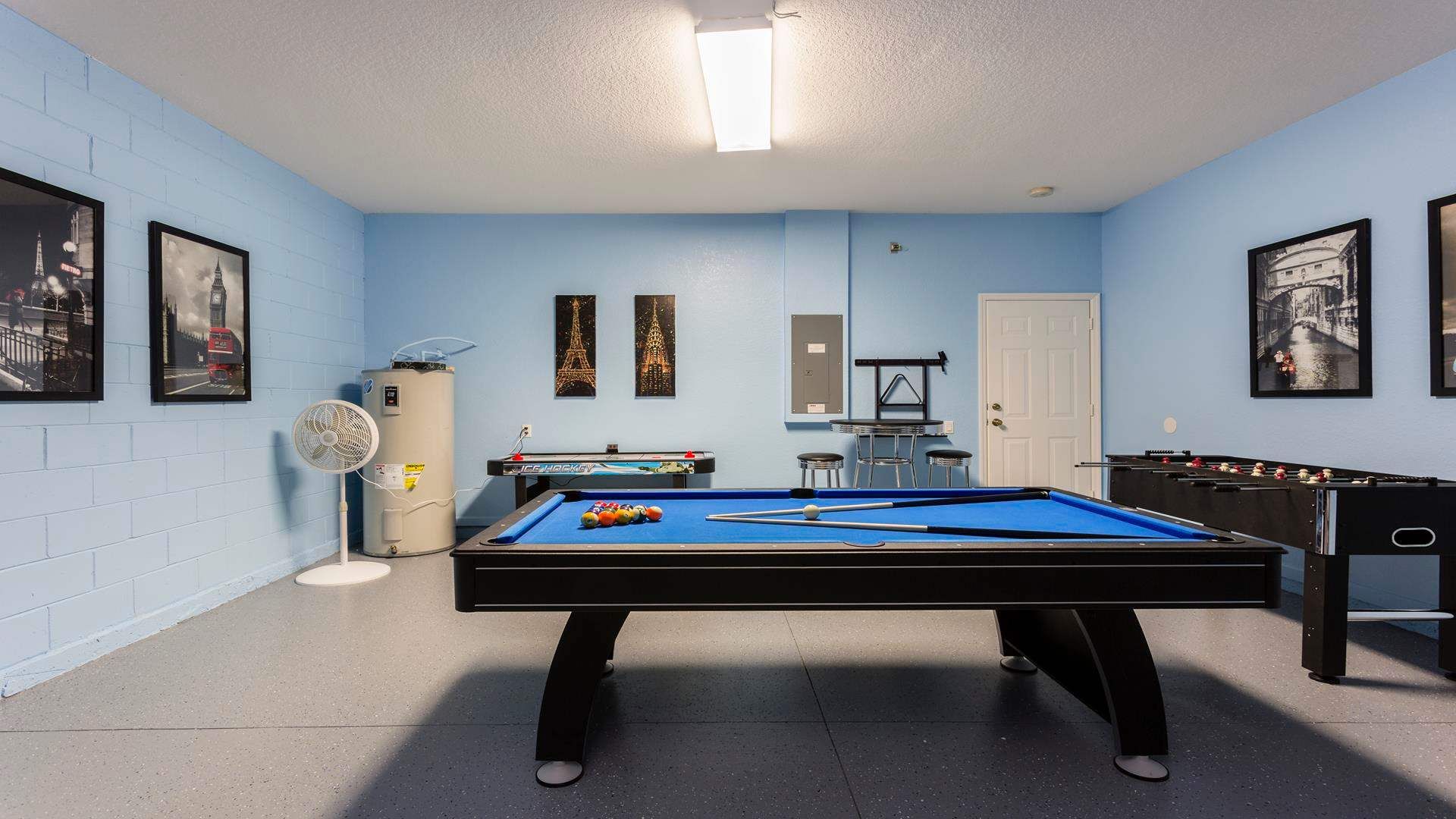 Enjoy a fun-filled game room with pool, foosball, air hockey, and lounge seating.