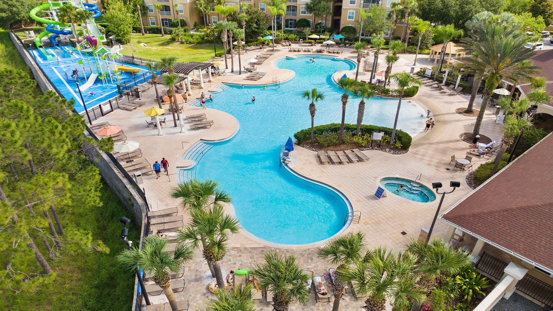 Waterfront resort with pools, slides & lush views—perfect for family fun!