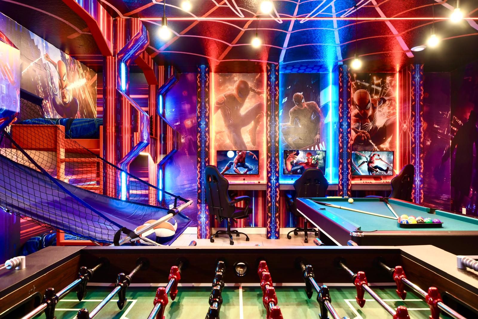 Ultimate Spider-Man-themed game room with bunk beds, arcade gaming, pool, and foosball.