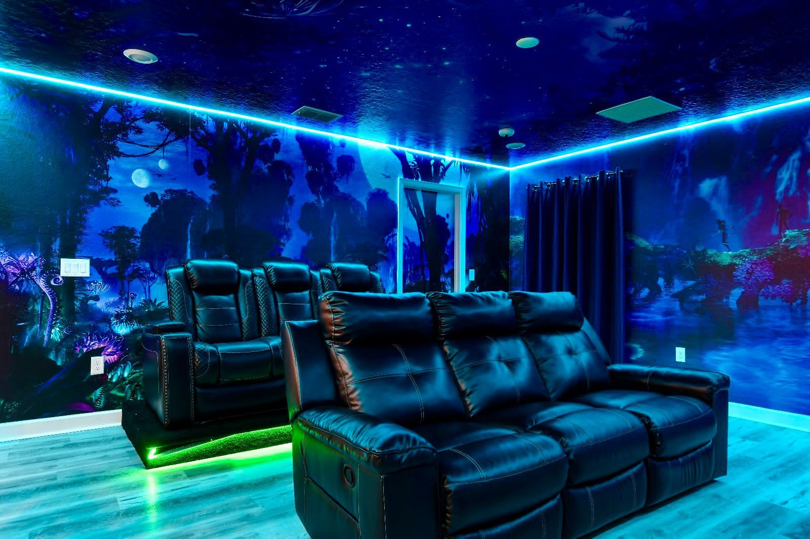 Immerse in a stunning Avatar-themed theater with LED lighting and plush seating.