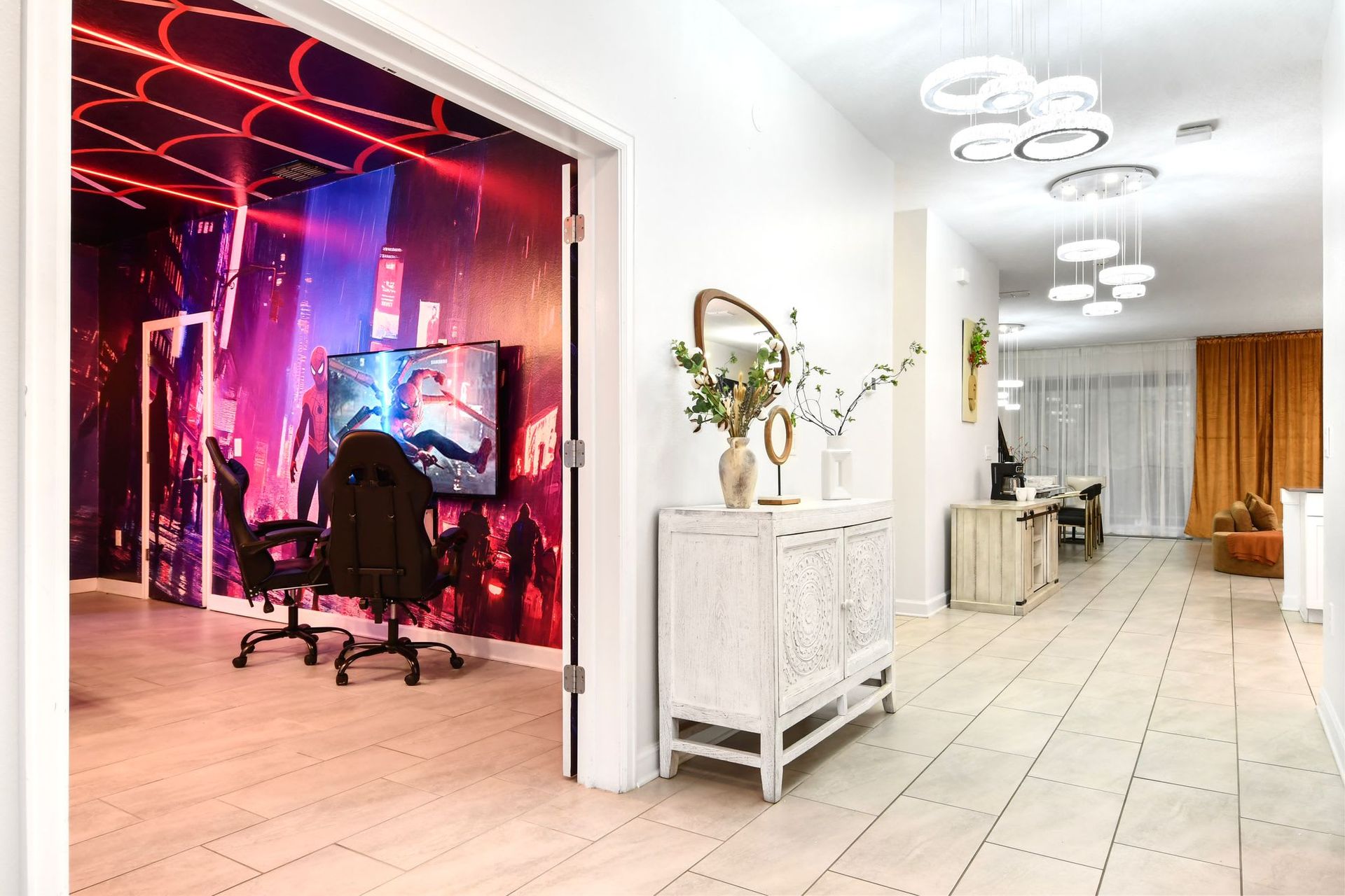 Modern home with elegant decor, stylish lighting, and an epic Spider-Man gaming room.