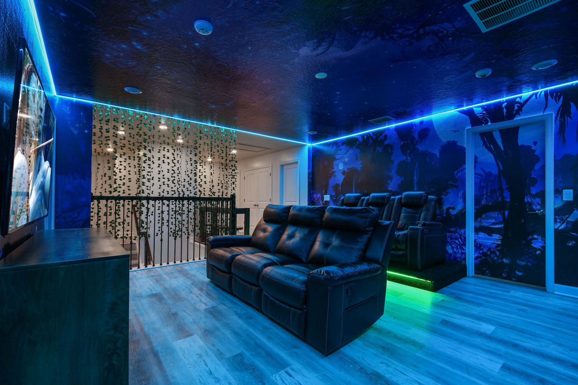 Immerse in a stunning Avatar-themed theater with LED lighting and plush seating.
