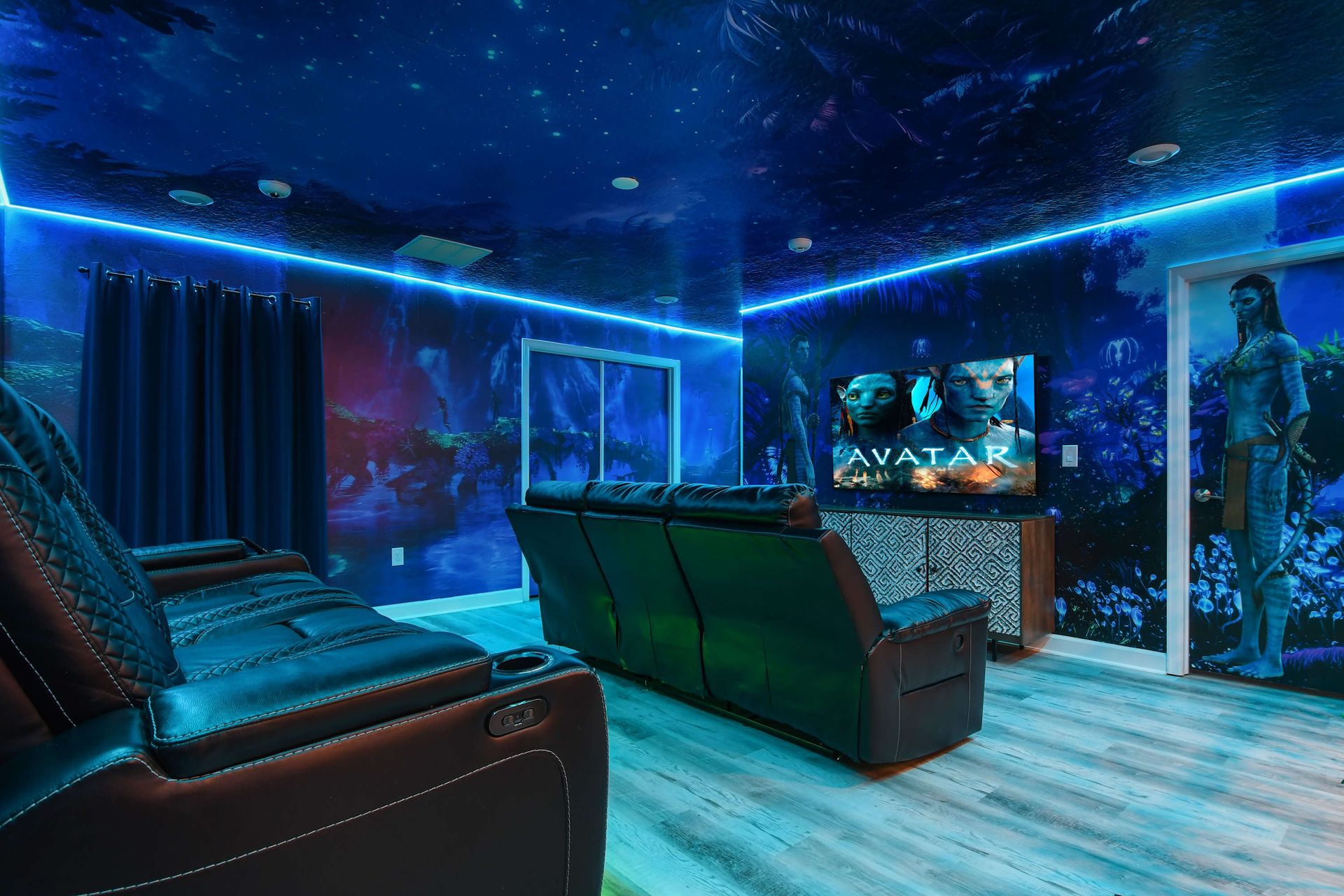 Immerse in a stunning Avatar-themed theater with LED lighting and plush seating.