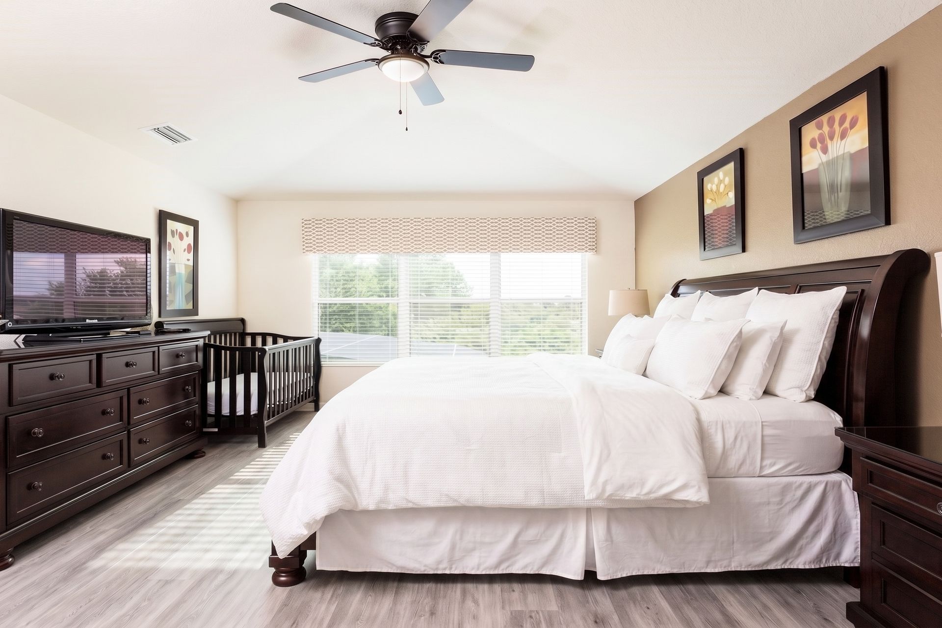 The master bedroom with a luxuriously large king bed