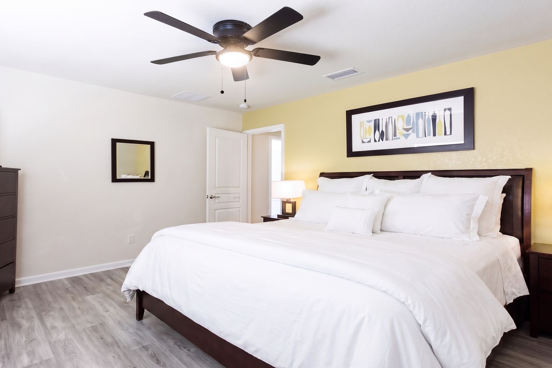 The spacious bedroom with a comfortable king bed