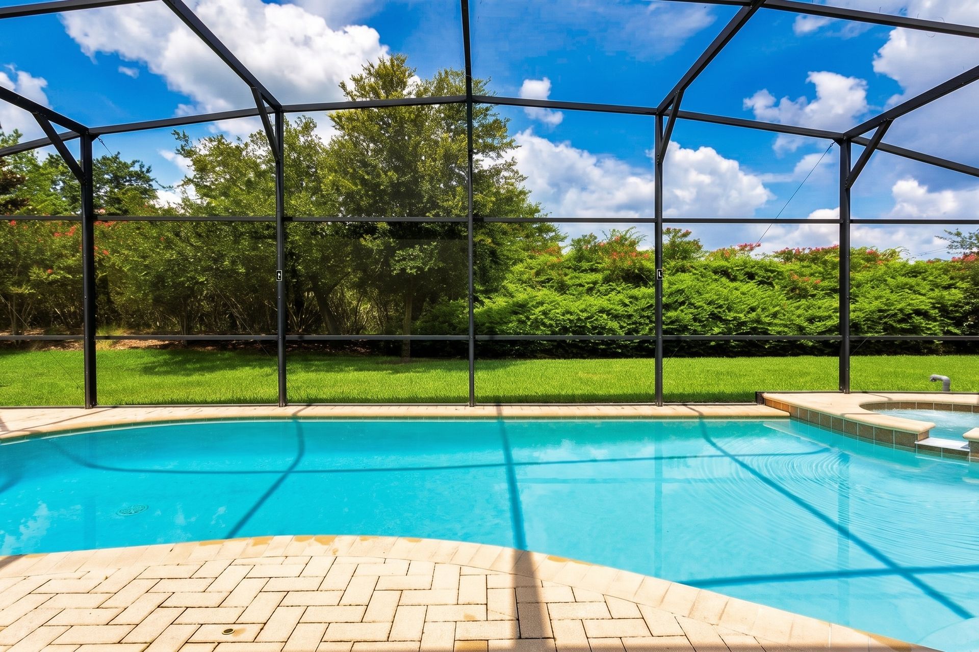 Year-round swimming: Screened pool for endless fun.
