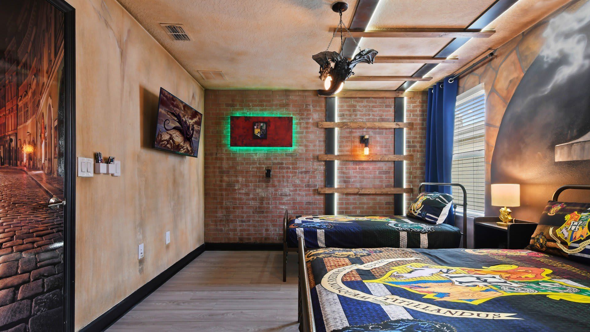 Magical Harry Potter-themed room with twin beds, dragon décor, and immersive design.