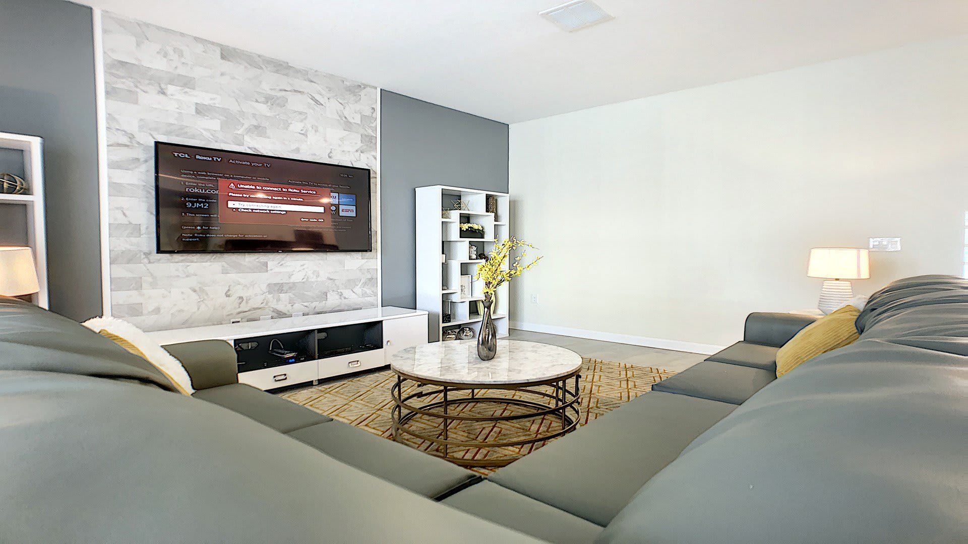 Kick back and relax in our spacious living room, where you can unwind with your favorite book or movie.