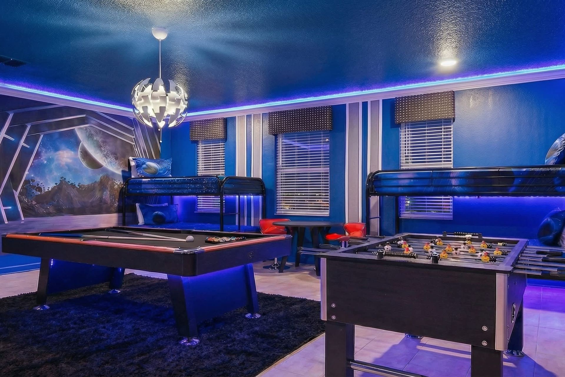 The game room bedroom is impeccably furnished with a Star Wars theme, enhanced by cool lights, creating a unique and captivating ambiance.