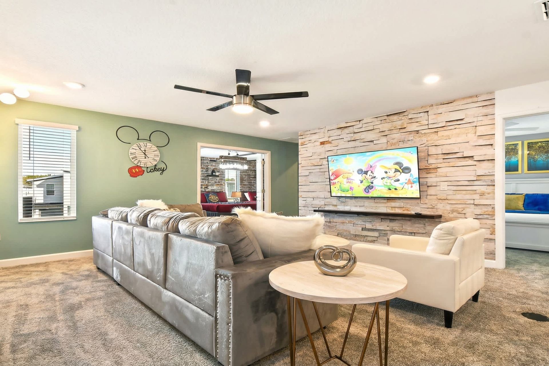 Relaxing lounge area adorned with a comfortable sofa, creating an inviting space for unwinding.