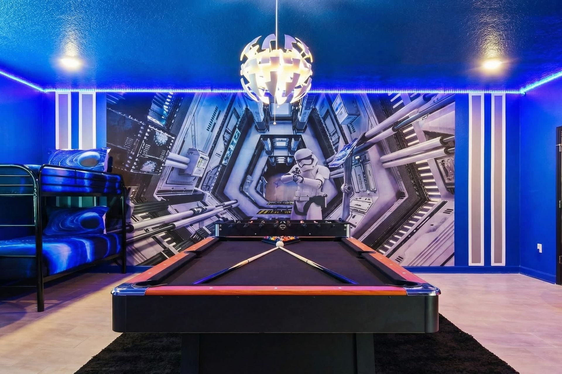 Innovative bedroom design seamlessly integrating a pool table, offering a unique and entertaining space.